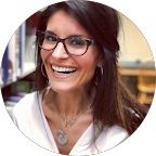 Google profile picture of Lauren Marie; a smiling woman with long brunette hair and glasses.