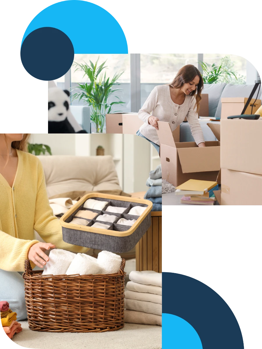 Two people organizing household items: one woman smiles while packing a moving box, and another person sorts towels and folded garments into wicker baskets and divided containers.